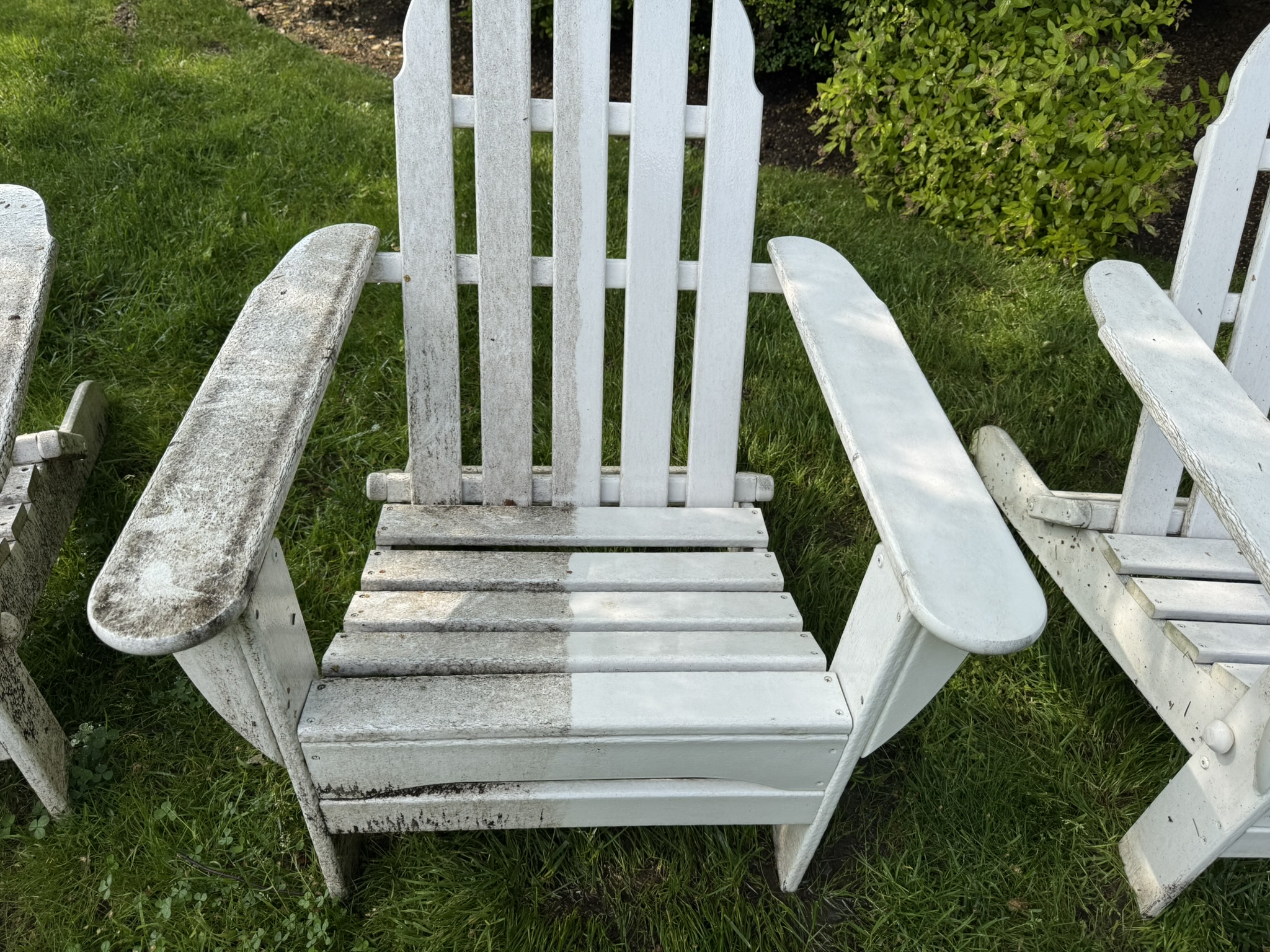 Adirondack chair showing dramatic before and after cleaning result