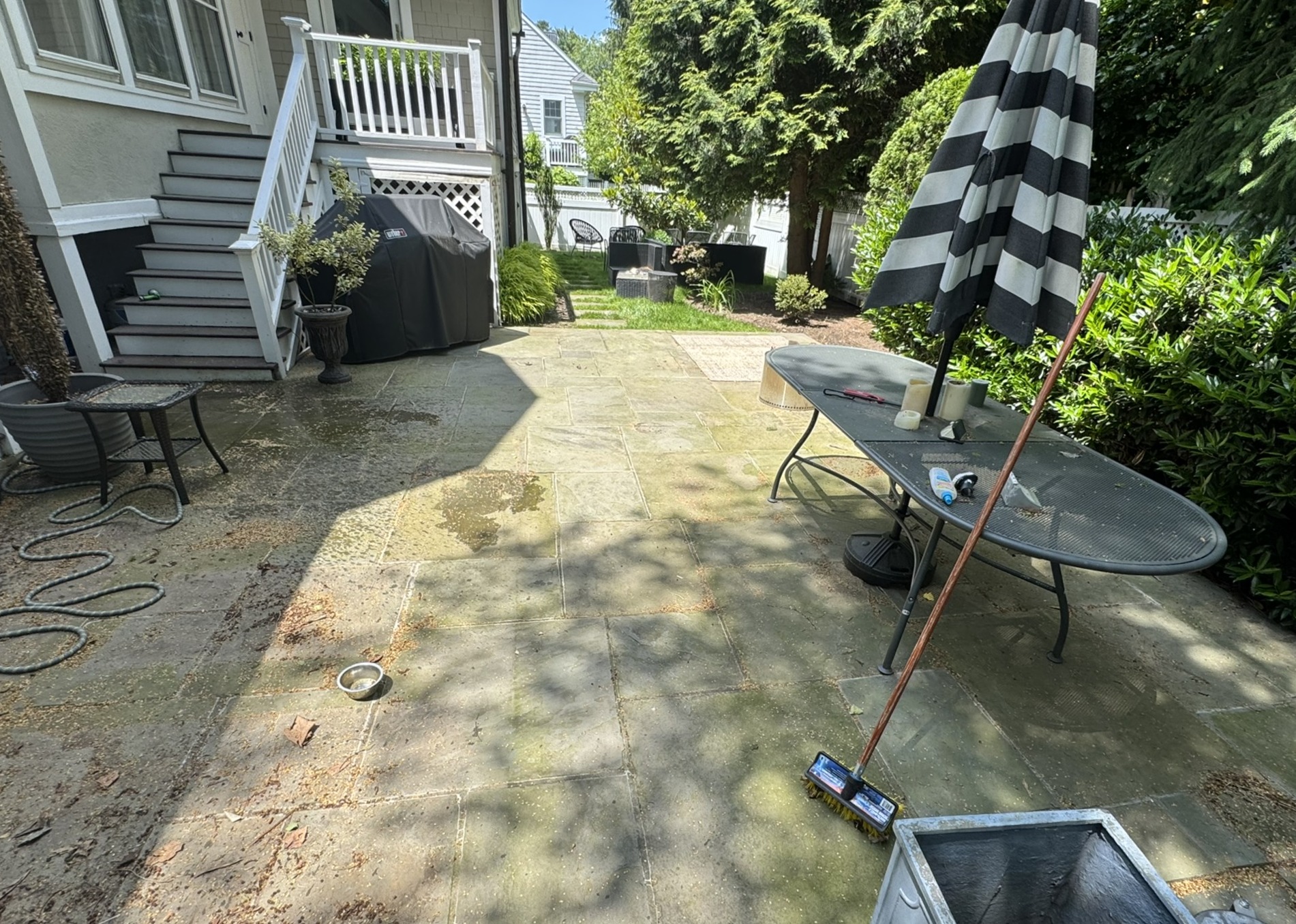 Stone patio before cleaning